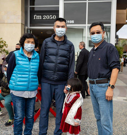 Jason J. Lee posing with a local Arcadia family.